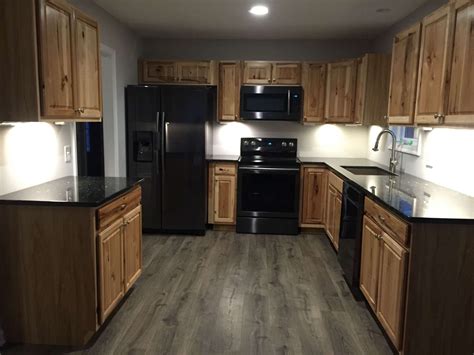 cabinet colors with black stainless steel appliances|hickory cabinets with black appliances.